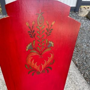 Painted details on chair back.
